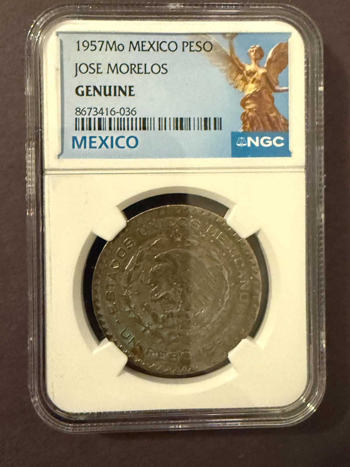 1957 Mo Mexico Silver Peso Jose Morelos NGC Genuine .720 Silver Coin