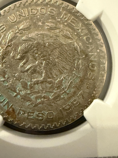 1957 Mo Mexico Silver Peso Jose Morelos NGC Genuine .720 Silver Coin