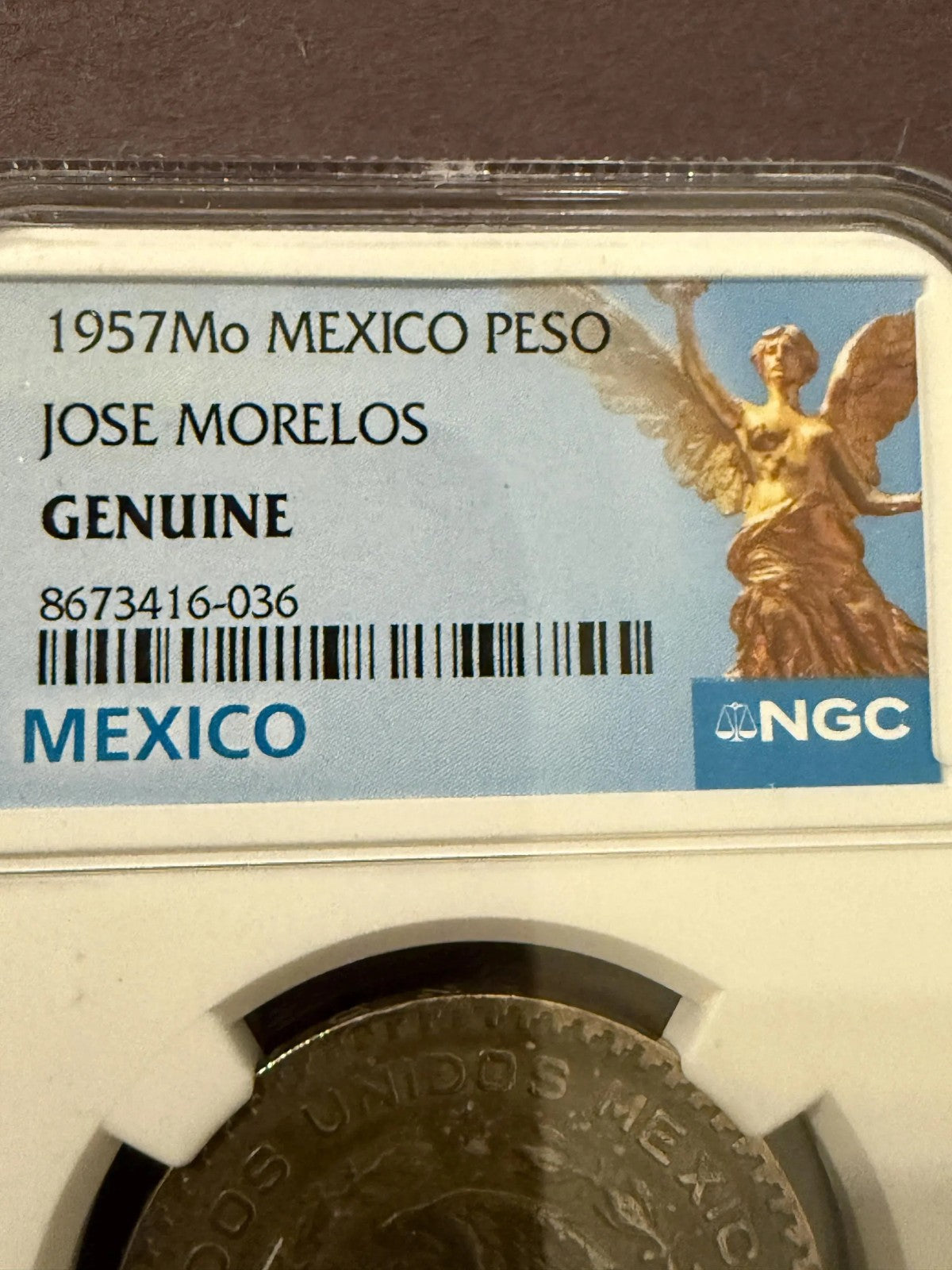 1957 Mo Mexico Silver Peso Jose Morelos NGC Genuine .720 Silver Coin