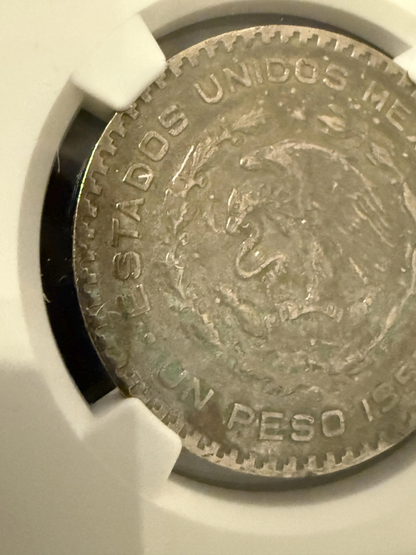 1957 Mo Mexico Silver Peso Jose Morelos NGC Genuine .720 Silver Coin