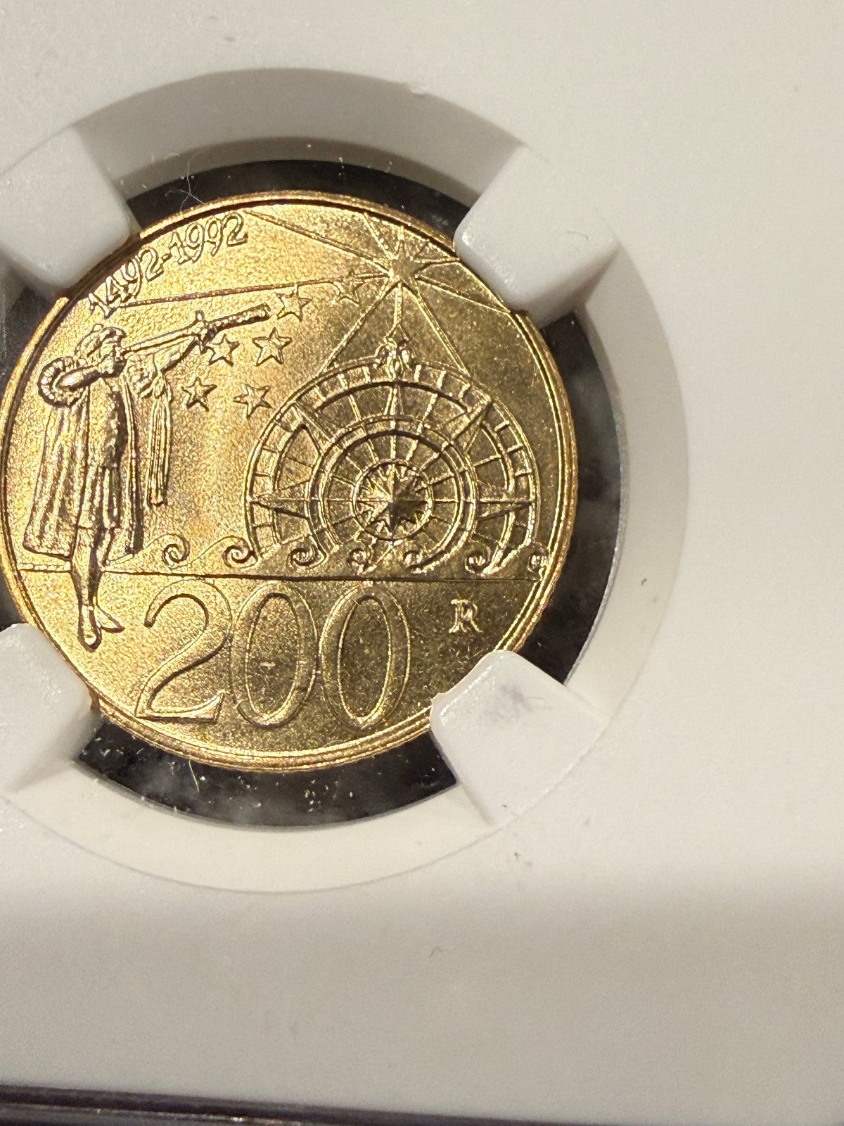 1992R San Marino 200 Lire Discovery of America NGC Genuine WWII Dates
